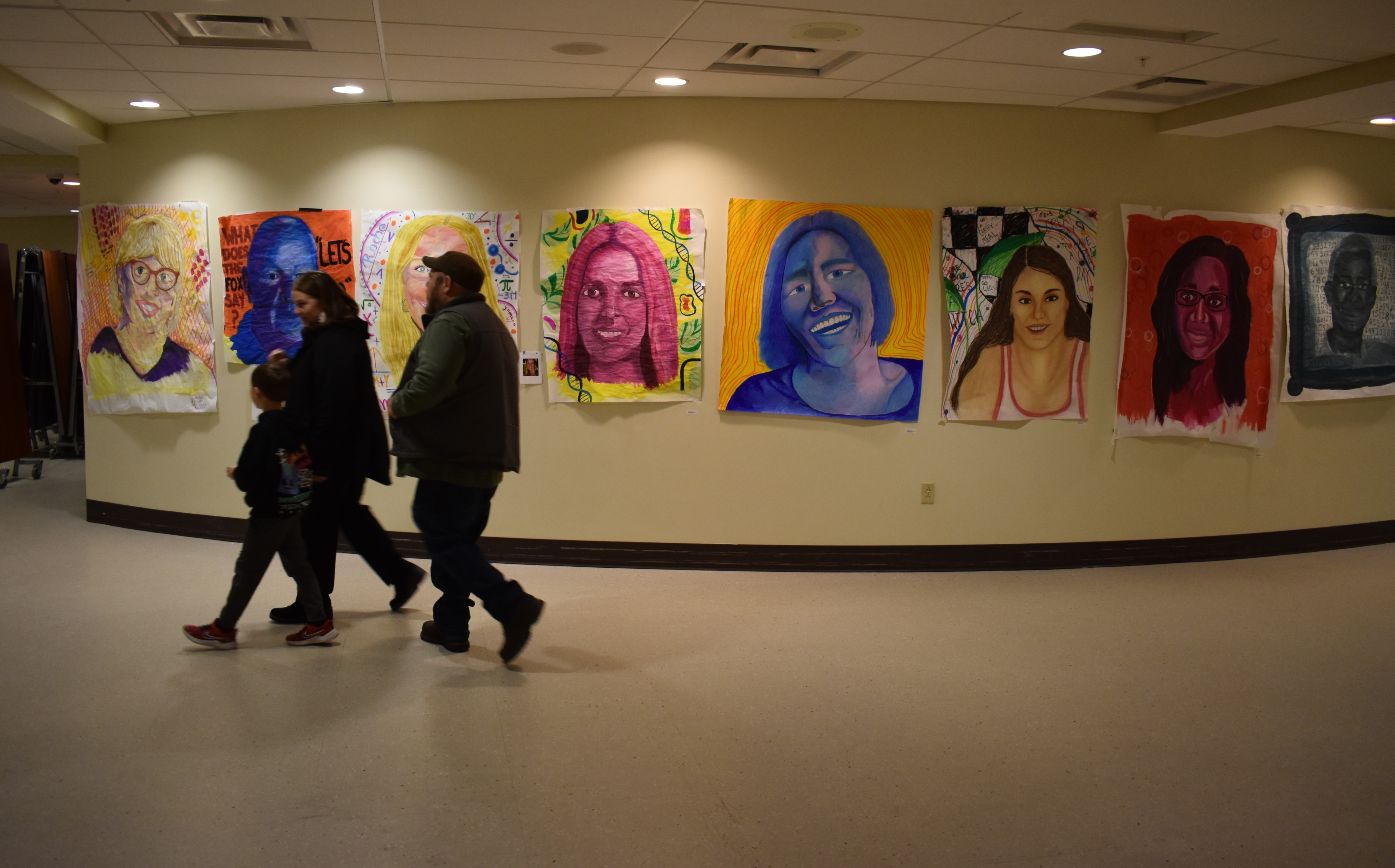 Portraits of staff members created by AP Art students for the 2026 Festival of the Arts.